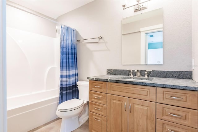 full bathroom with shower / bath combo, vanity, and toilet