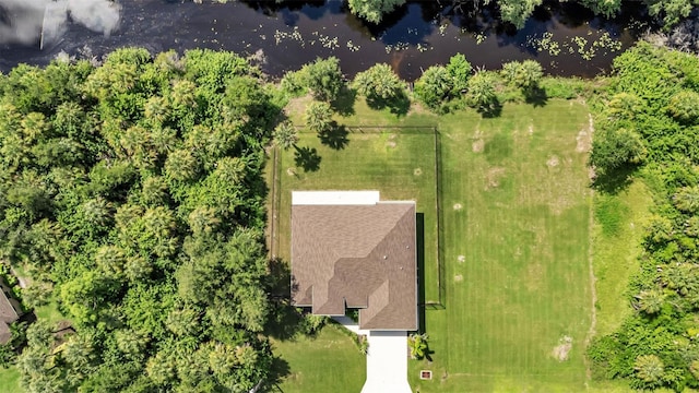 bird's eye view with a water view