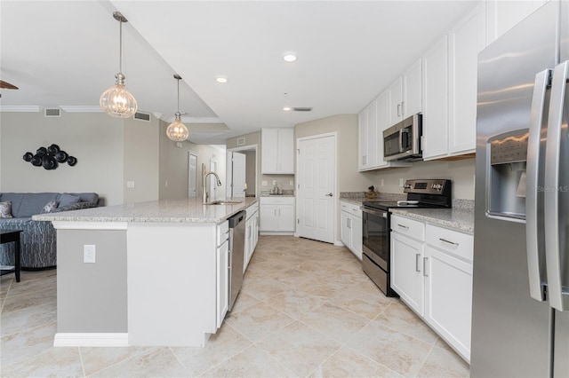 kitchen with sink, white cabinetry, stainless steel appliances, a center island with sink, and crown molding