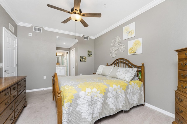 bedroom featuring crown molding, ensuite bath, ceiling fan, and light carpet