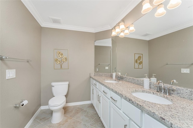 bathroom featuring ornamental molding, toilet, vanity, and tile patterned floors