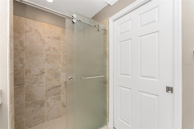 bathroom featuring an enclosed shower