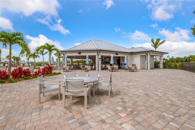 view of patio / terrace featuring ceiling fan