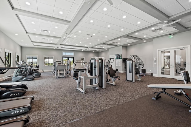 workout area featuring ceiling fan and french doors