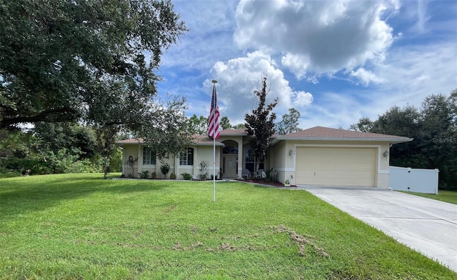 ranch-style home with a front yard and a garage