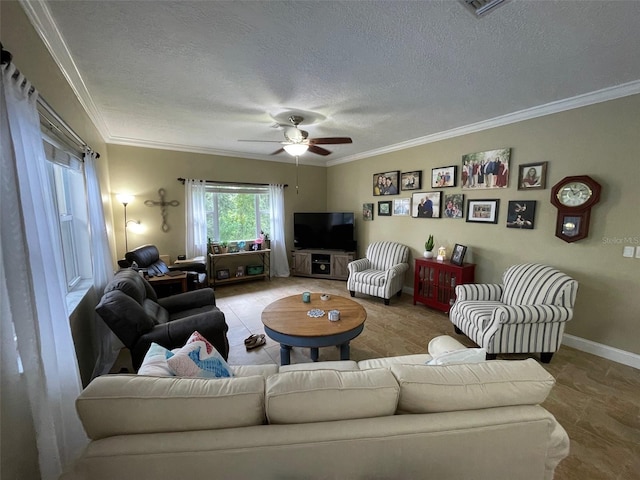 living room with a textured ceiling, ceiling fan, and crown molding