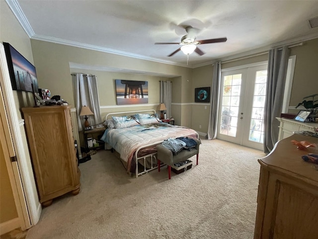 carpeted bedroom with french doors, ornamental molding, access to outside, and ceiling fan