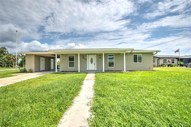 single story home with a carport and a front lawn