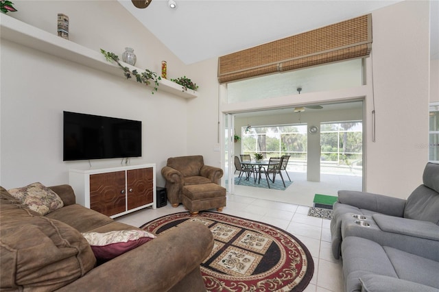 tiled living room with high vaulted ceiling