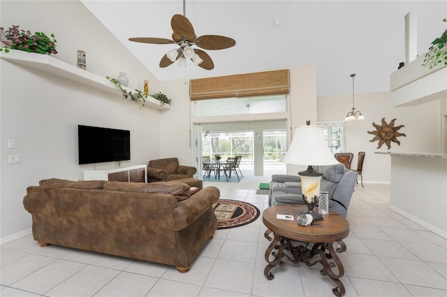 living room with ceiling fan, light tile patterned floors, and high vaulted ceiling