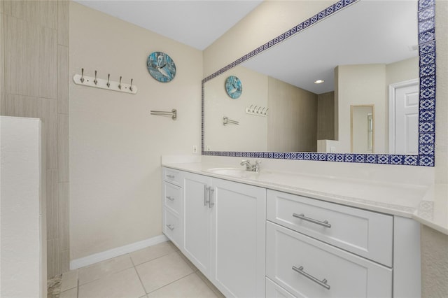 bathroom with vanity and tile patterned floors