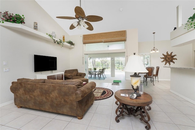 16407 San Edmundo Rd, Punta Gorda, FL 33955 - living room featuring high vaulted ceiling, a ceiling fan, and light tile patterned floors