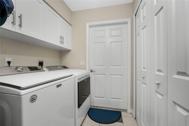 16407 San Edmundo Rd, Punta Gorda, FL 33955 - washroom with cabinet space, independent washer and dryer, and light tile patterned floors