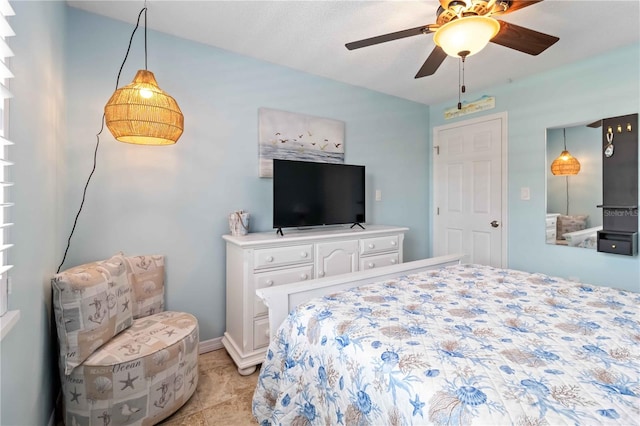 bedroom featuring ceiling fan