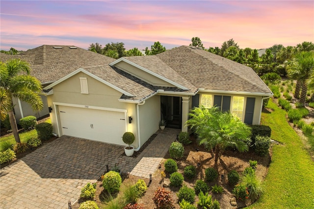 view of front of house with a garage