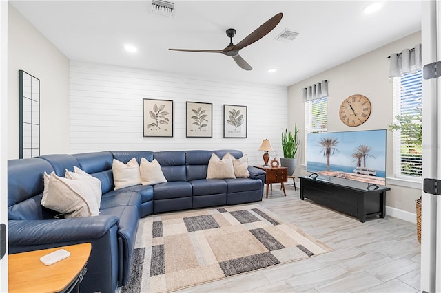 living room with ceiling fan