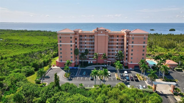 view of building exterior with a water view