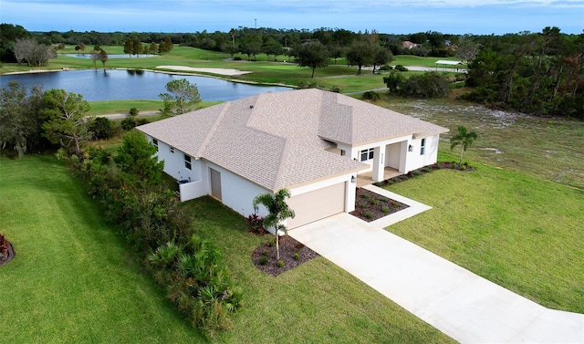 bird's eye view with a water view