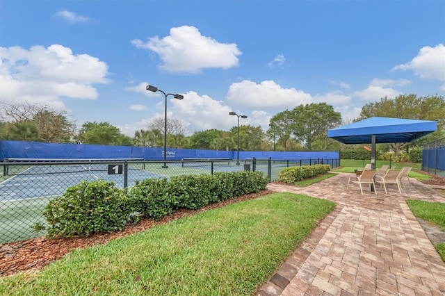 exterior space with tennis court