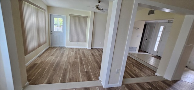 entrance foyer with hardwood / wood-style floors and ceiling fan