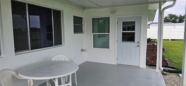 doorway to property featuring a patio area