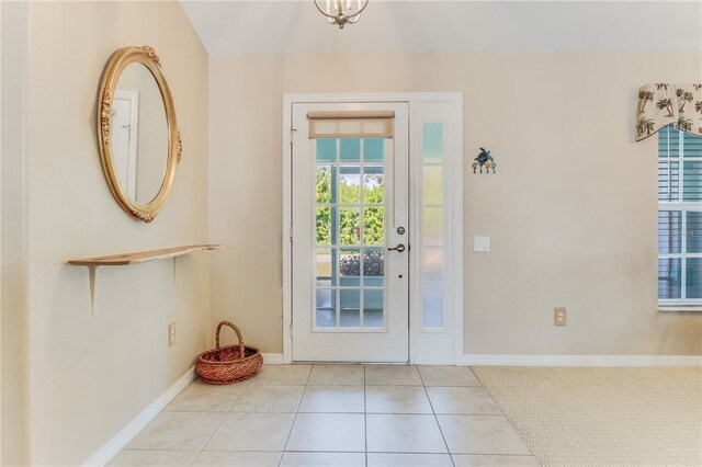 entryway featuring light tile patterned flooring