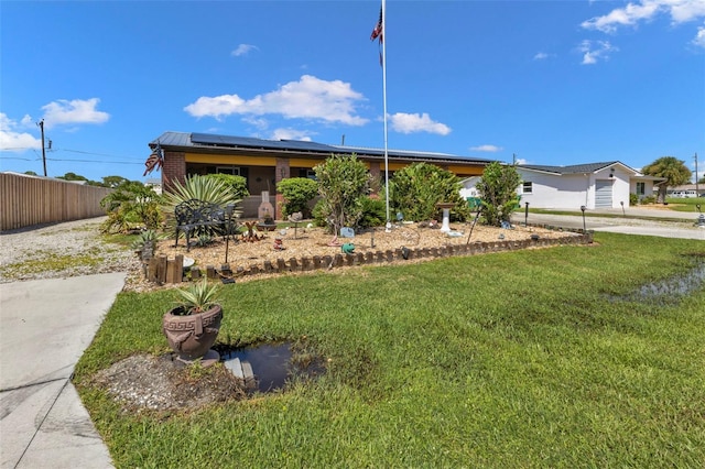 view of front of home with a front lawn