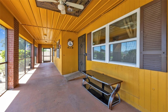 interior space featuring ceiling fan