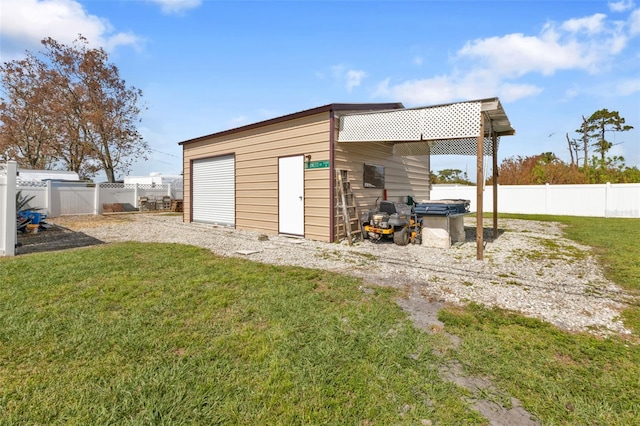 garage with a yard