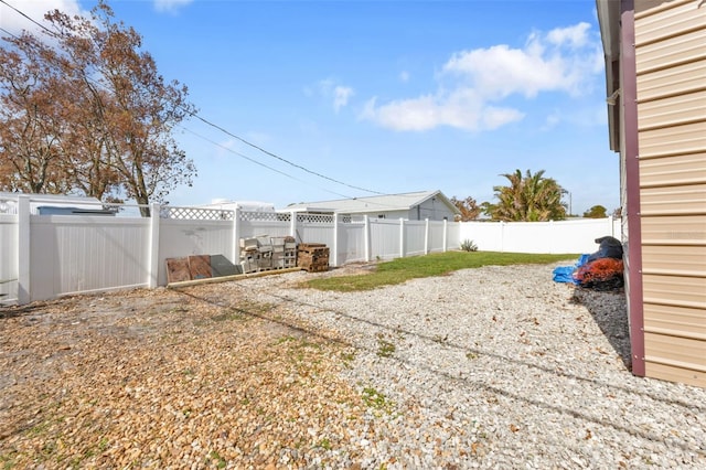 view of yard with a patio area