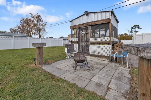 view of patio with a fire pit