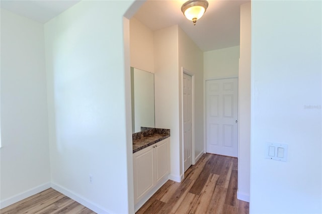 hallway featuring light wood-type flooring