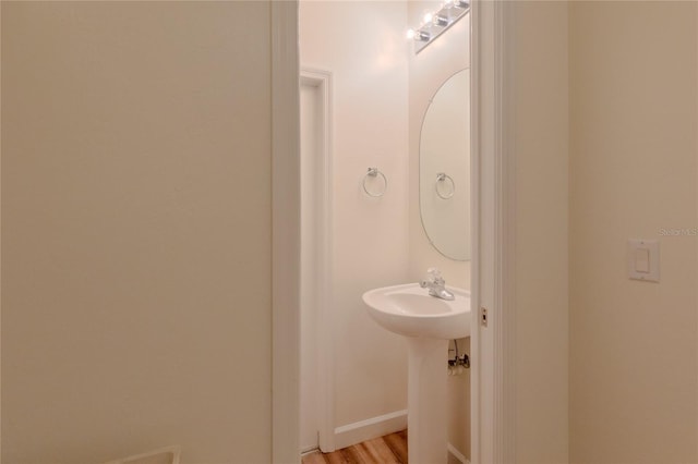 bathroom featuring hardwood / wood-style floors