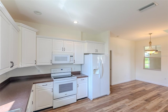 kitchen featuring white cabinets, white appliances, and light hardwood / wood-style floors