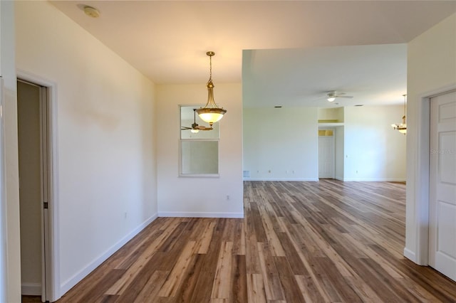 unfurnished room featuring wood-type flooring and ceiling fan