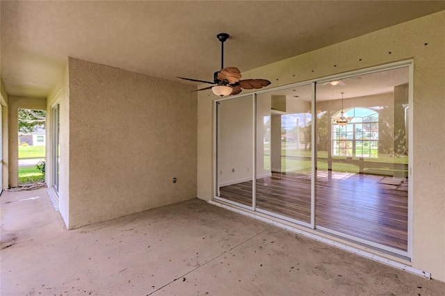 view of patio / terrace featuring ceiling fan