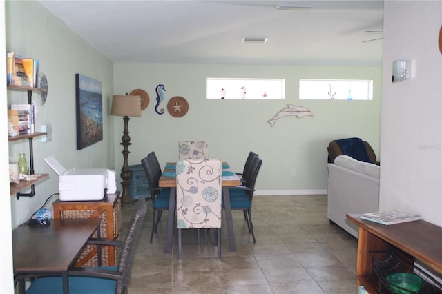 dining space with ceiling fan