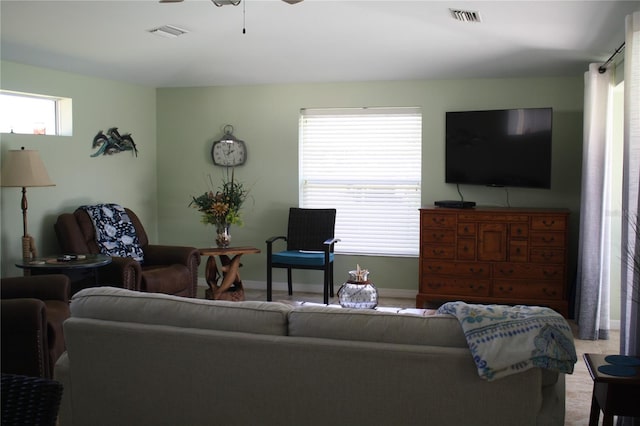 living room featuring ceiling fan