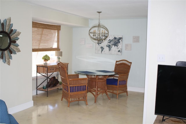 dining room with a chandelier