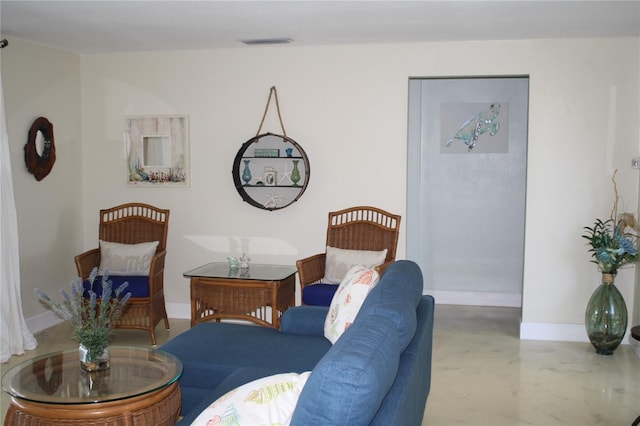 living room with concrete floors