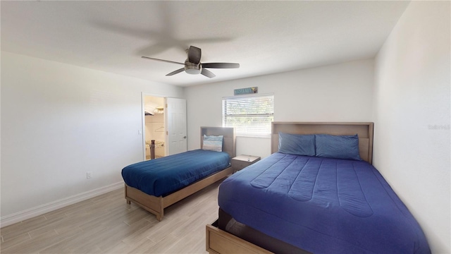 bedroom with light wood-type flooring and ceiling fan