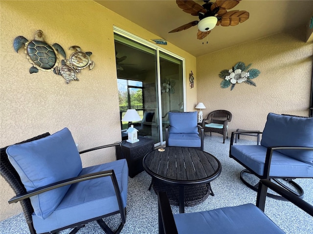 view of patio featuring ceiling fan