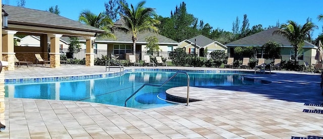 view of pool featuring a patio area