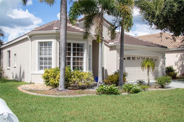 view of home's exterior featuring a garage and a yard