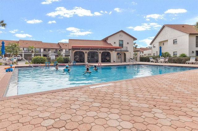 view of pool with a patio area