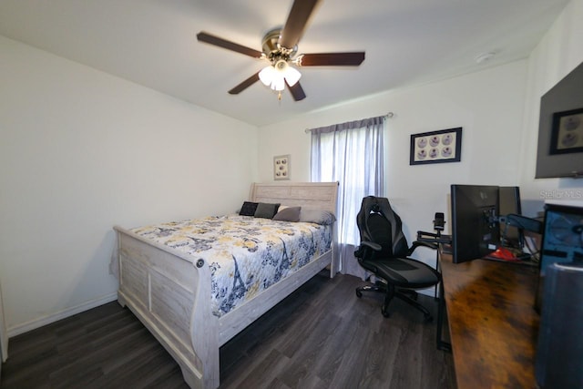 bedroom with ceiling fan and dark wood-type flooring