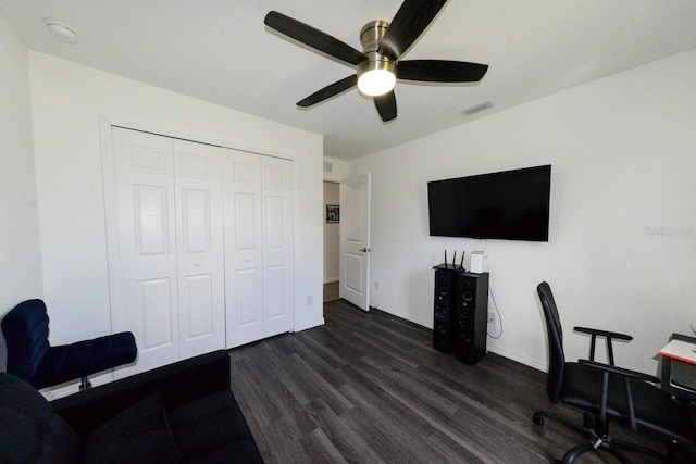 office area with ceiling fan and dark hardwood / wood-style flooring