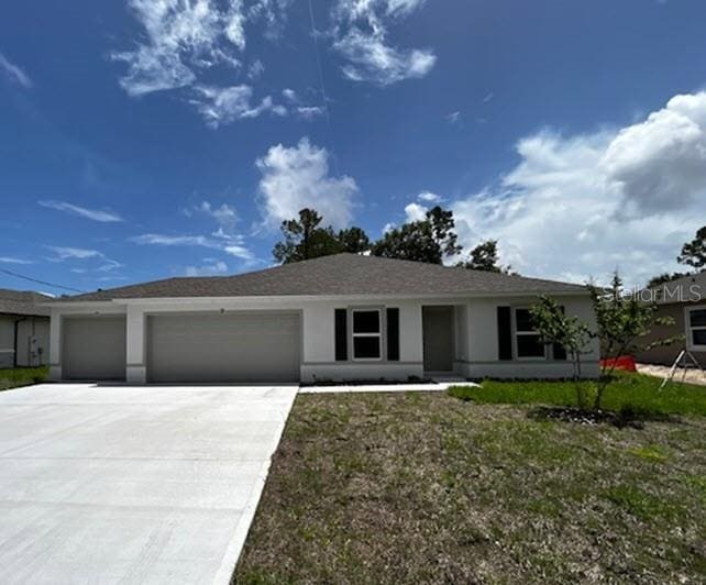 ranch-style home with a garage