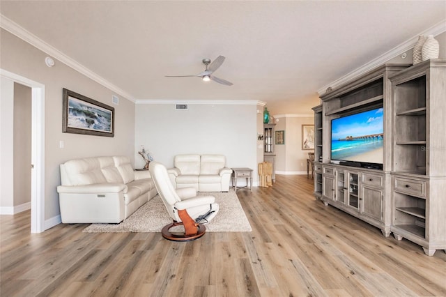 living room with ceiling fan, light hardwood / wood-style flooring, and ornamental molding