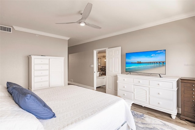 bedroom featuring visible vents, crown molding, baseboards, a ceiling fan, and light wood-style floors